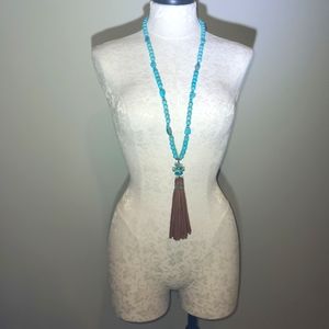 Chico’s turqoise necklace with silver accents.